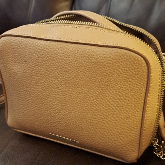Like Dreams small purse.  Bow detail.  Tan and gold.  Excellent used condition. - Picture 3 of 3